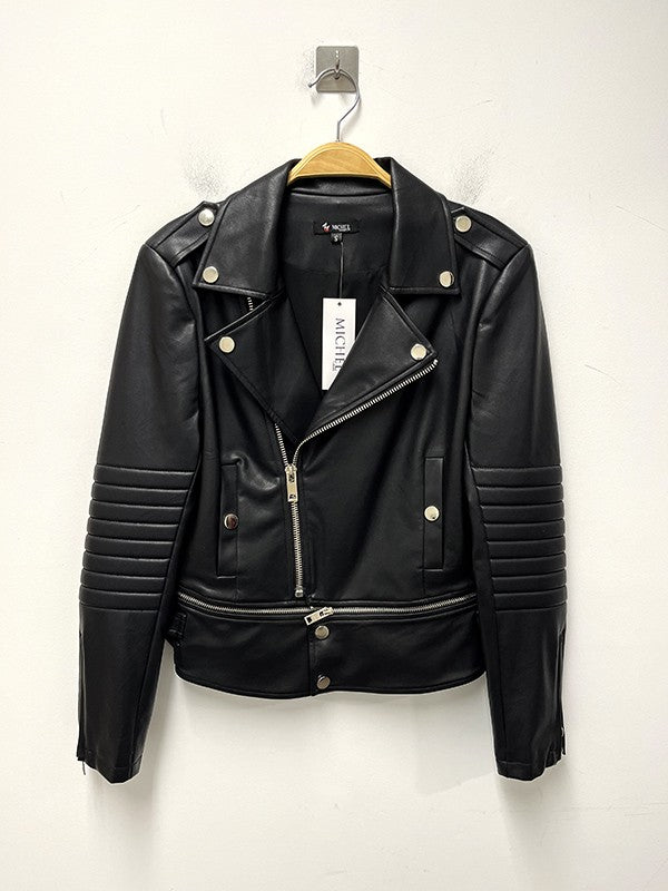 Black leather jacket with gold buttons on a hanger against a white background